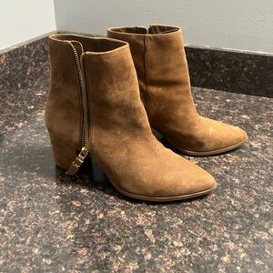 Women’s Michael Kors boots.